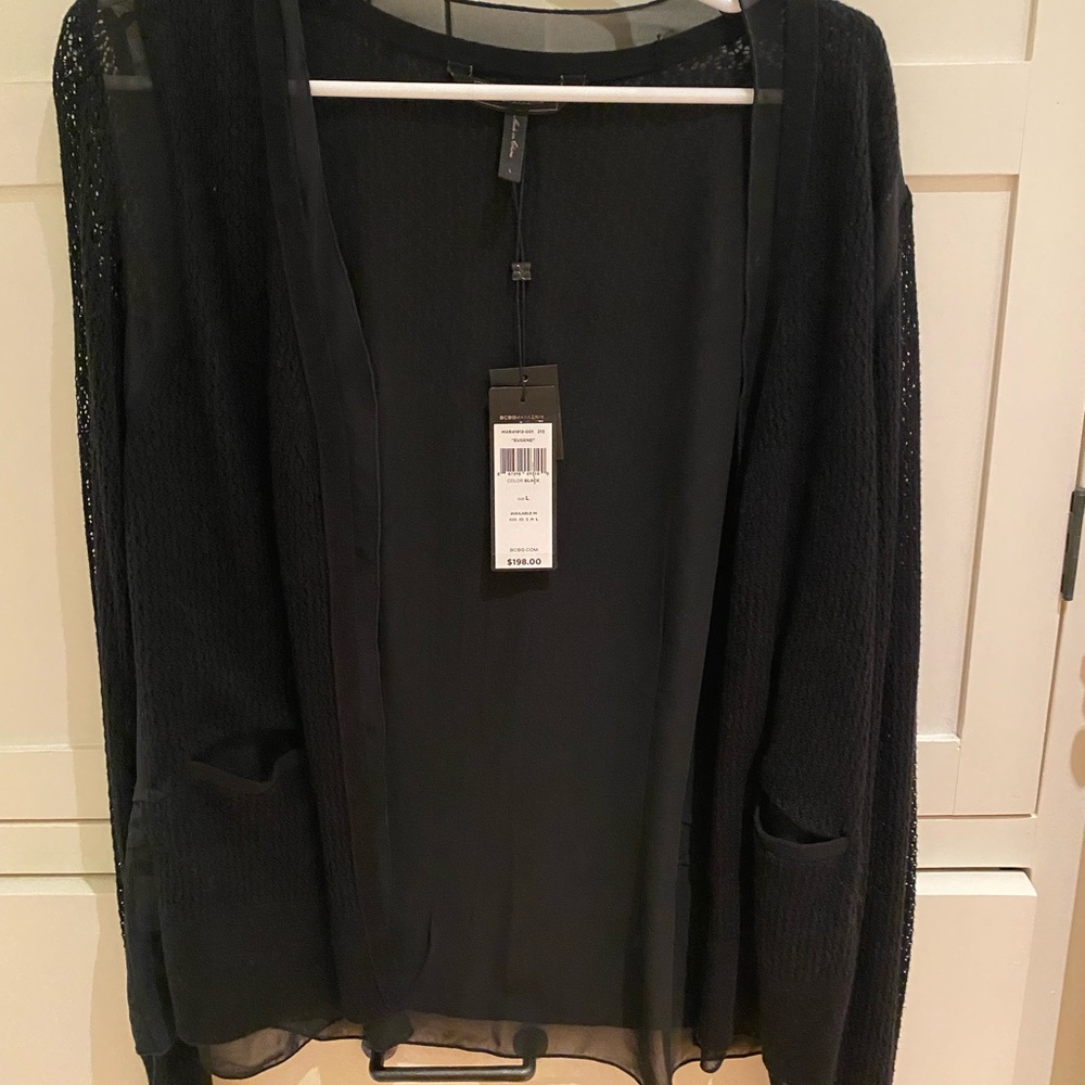 Womens BCBG Maxaria Eugene sweater. Size large. New. Black